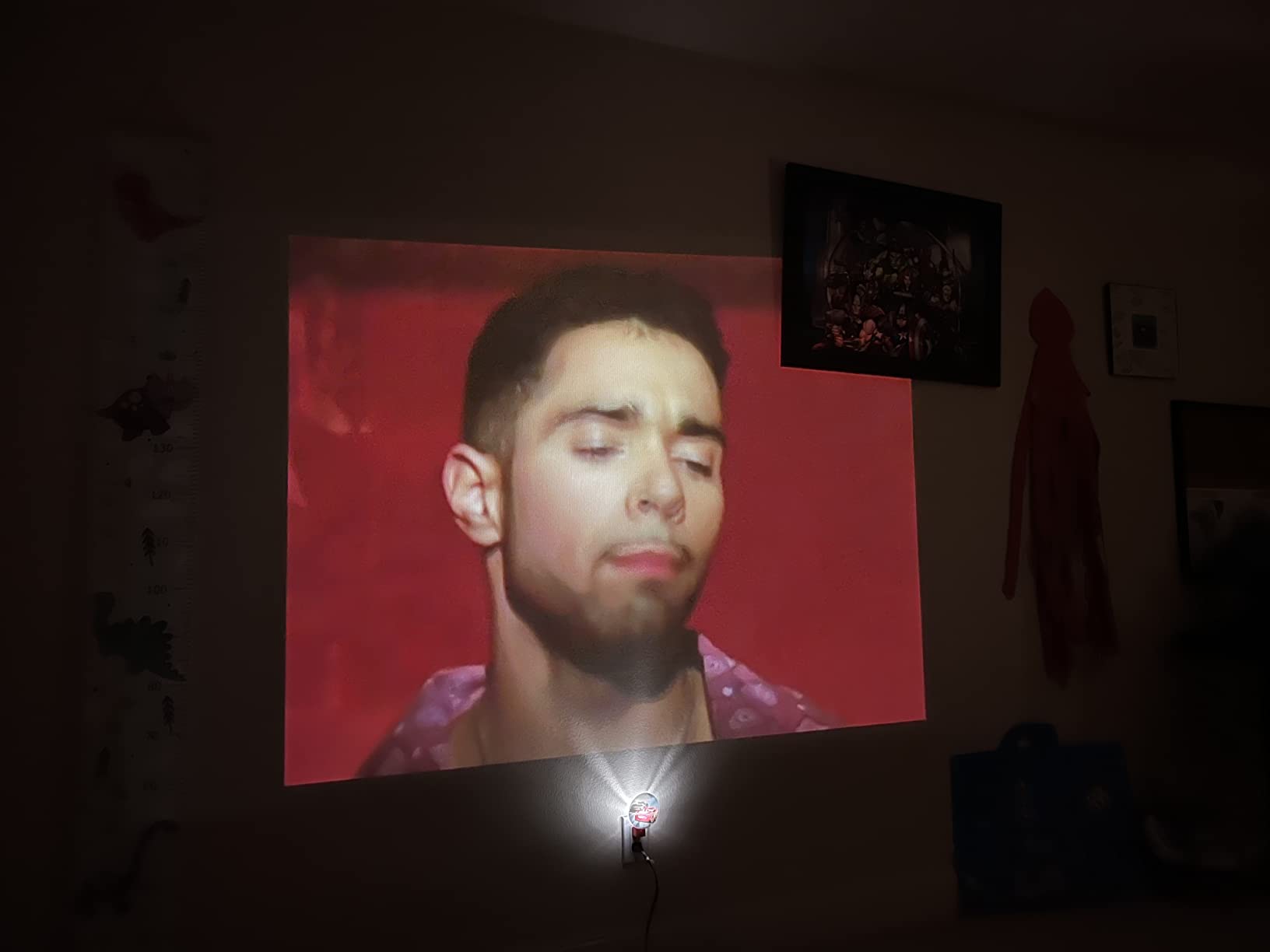 Anker Nebula Capsule, Smart Wi-Fi Mini Projector, 100 ANSI Lumen Portable Projector, 360 Speaker, Movie Projector, 100 Inch Picture, 4Hr Video Playtime for Inside and Outside, Watch Anywhere customer photo 1