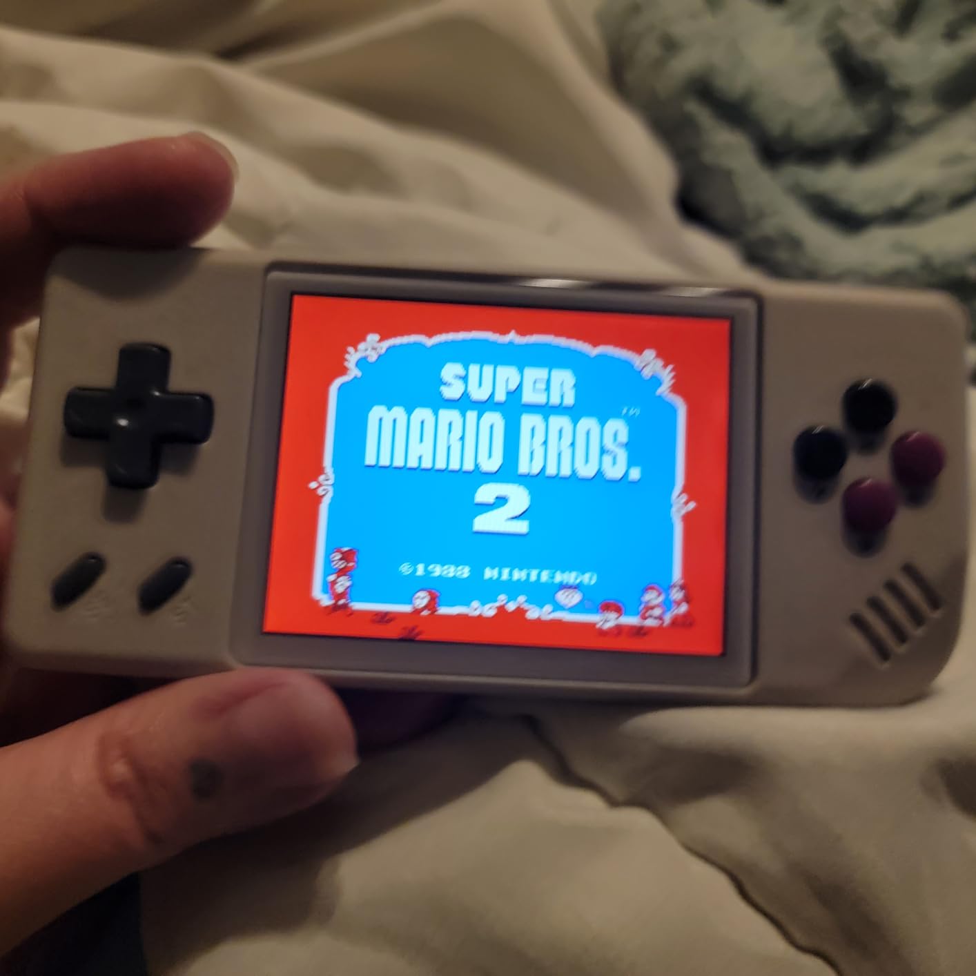 ANBERNIC RG28XX Retro Handheld Game Console, Linux System, 2.83 Inch IPS Screen, 64G Built-in 5516 Classic Games, H700 Quad-Core, TV Output, 3100mAh Battery, Transparent Black(Gray) customer photo 1