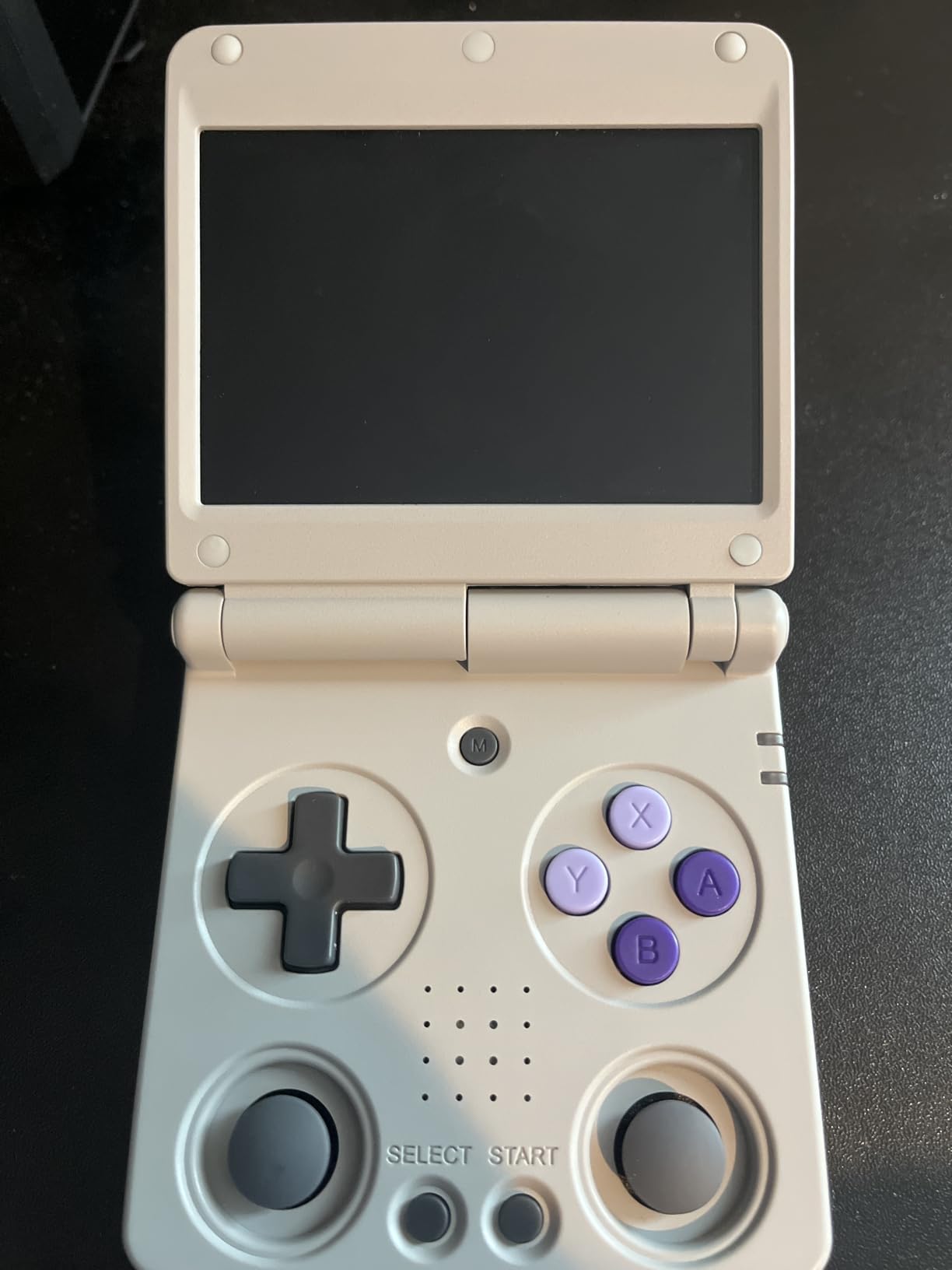 Anbernic RG35XXSP Flip Retro Handheld Game with 3.5 Inch IPS Screen Linux System Built-in 64G TF Card 5532 Games Support 5G WiFi Bluetooth TV Output(Silver-new) customer photo 1