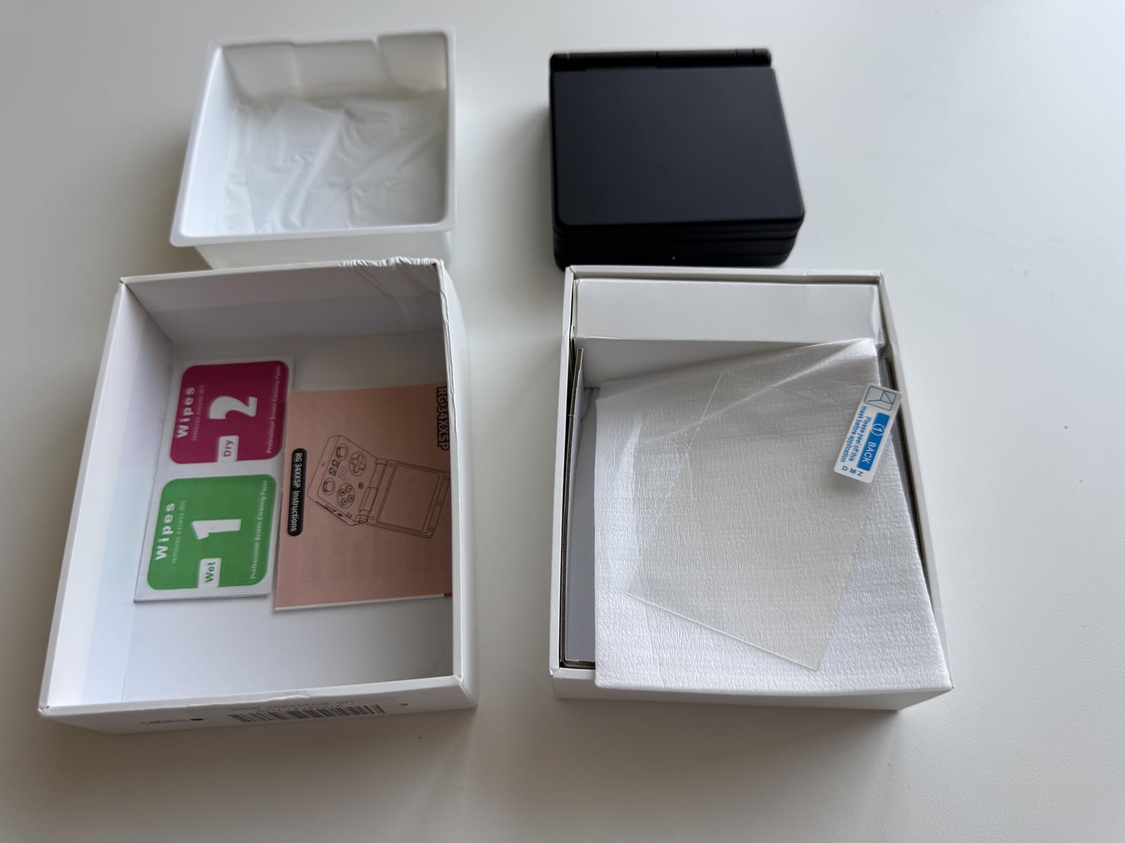 Anbernic RG35XXSP Flip Retro Handheld Game with 3.5 Inch IPS Screen Linux System Built-in 64G TF Card 5532 Games Support 5G WiFi Bluetooth TV Output(Silver-new) customer photo 2