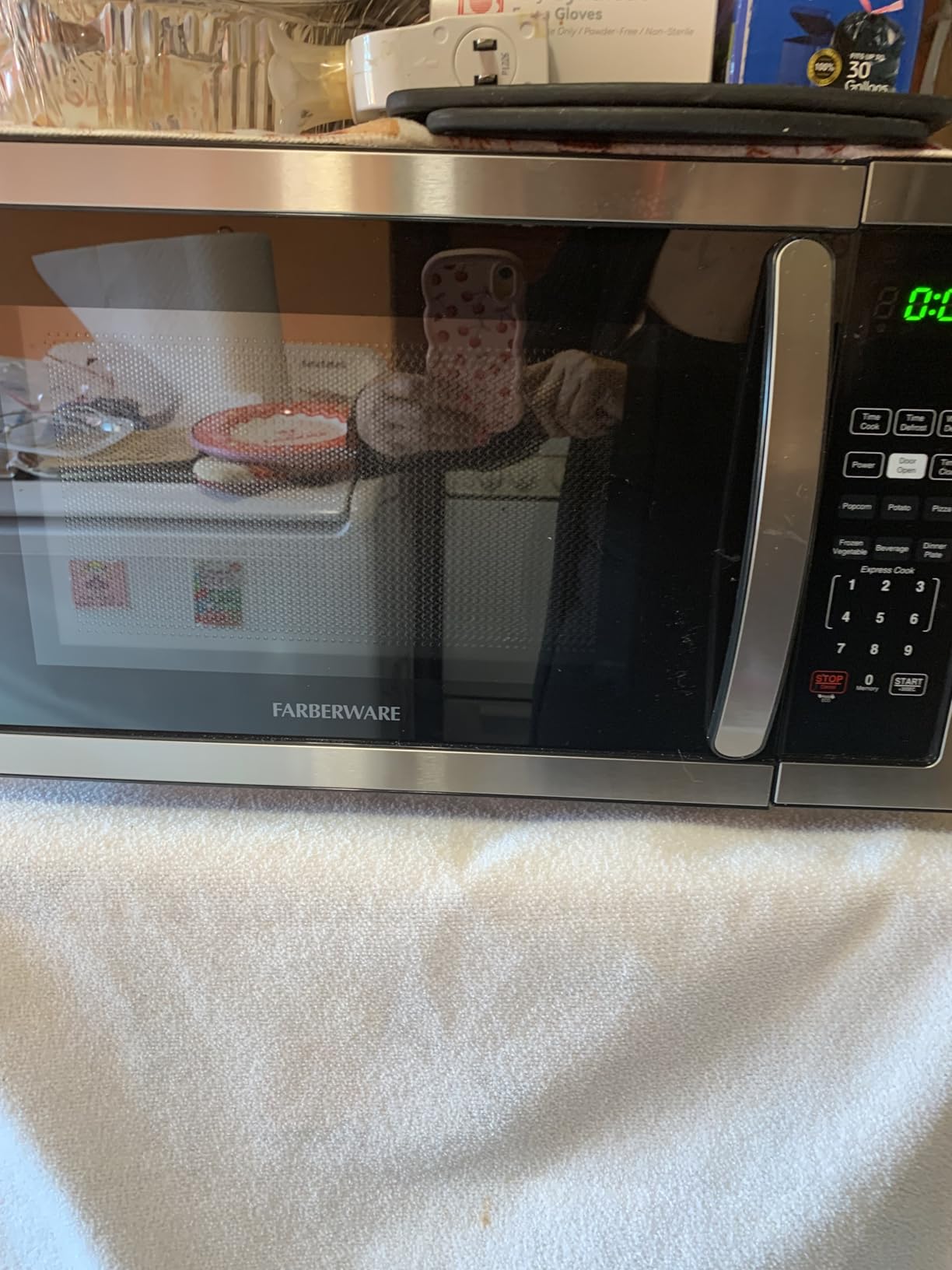 Farberware 1.1 Cu. Ft. Countertop Microwave Oven - 1000 Watts Power, Auto Cook Settings, Defrost, Easy Clean and Child Safety Lock - Stainless customer photo 1