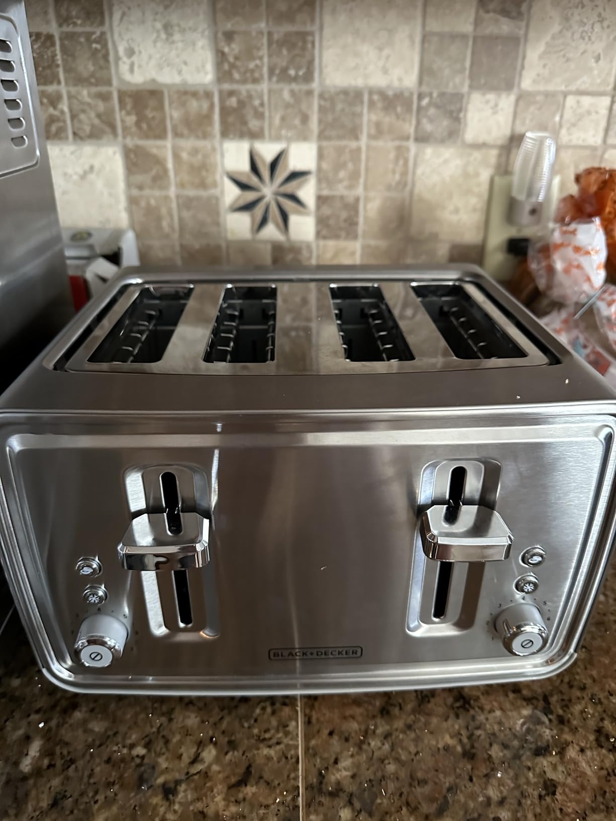 BLACK+DECKER 4-Slice Toaster with Dual Shade Controls | 4-slice toaster with dual shade controls, extra lift levers and pull-out crumb trays for easy cleanup. customer photo 1