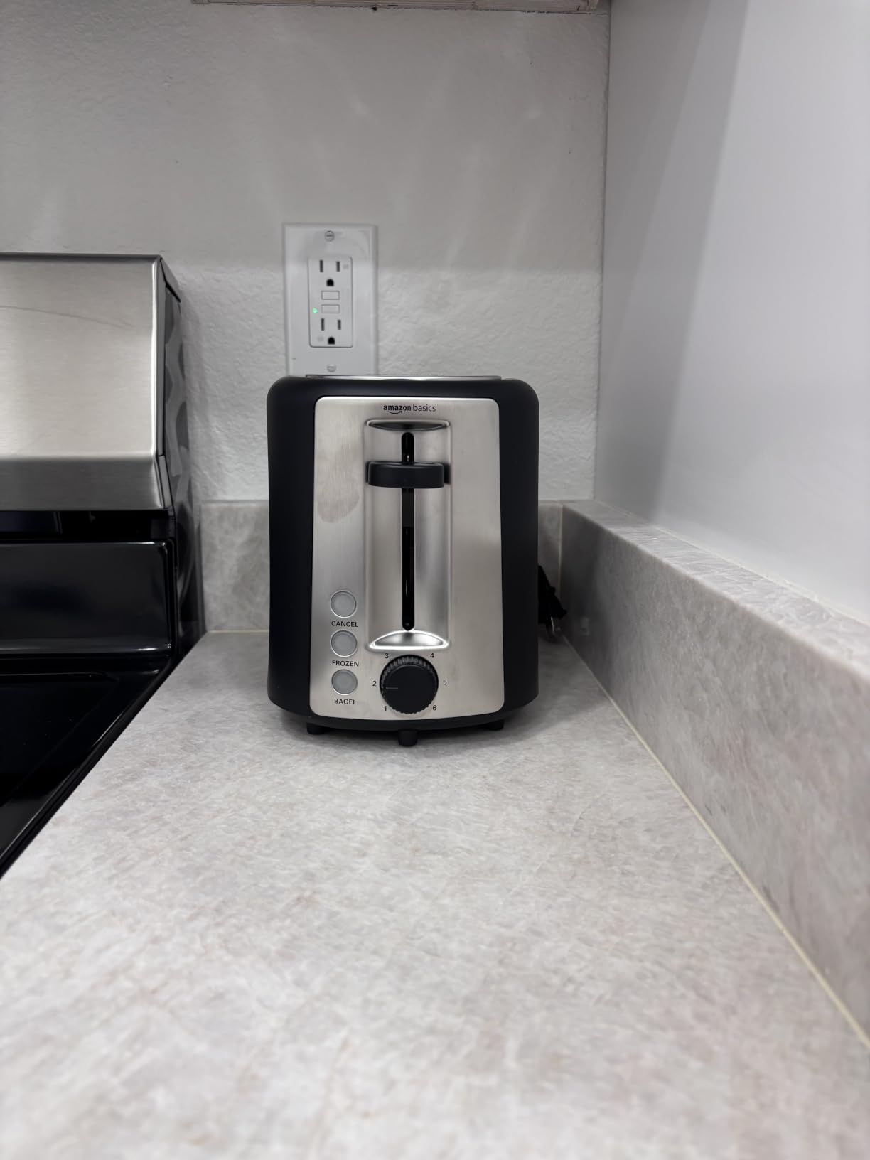 Amazon Basics 2 Slice Toaster, Extra Wide Slots for Bagels, 6 Browning Settings, Removable Crumb Tray, Defrost/Cancel/Bagel Buttons, Cord Wrap, 900W, Black & Silver customer photo 2