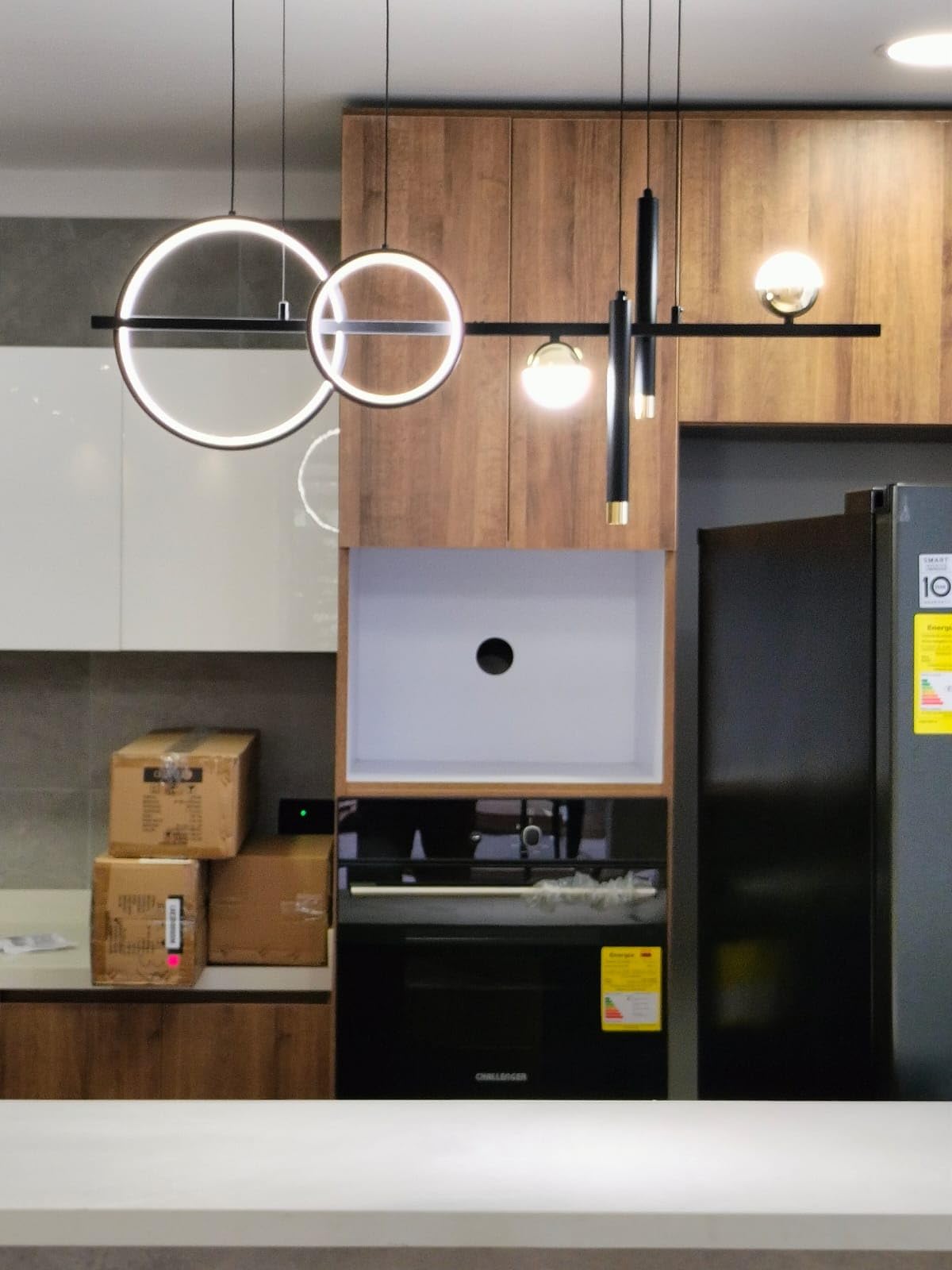 ORANOOR Modern LED Pendant Lights, Dimmable 39in Linear Wave LED Chandelier Lighting, Black and Gold Dining Room Hanging Light Fixtures Kitchen Island Globe Pendant Light for Dining Table (2705lm) customer photo 1