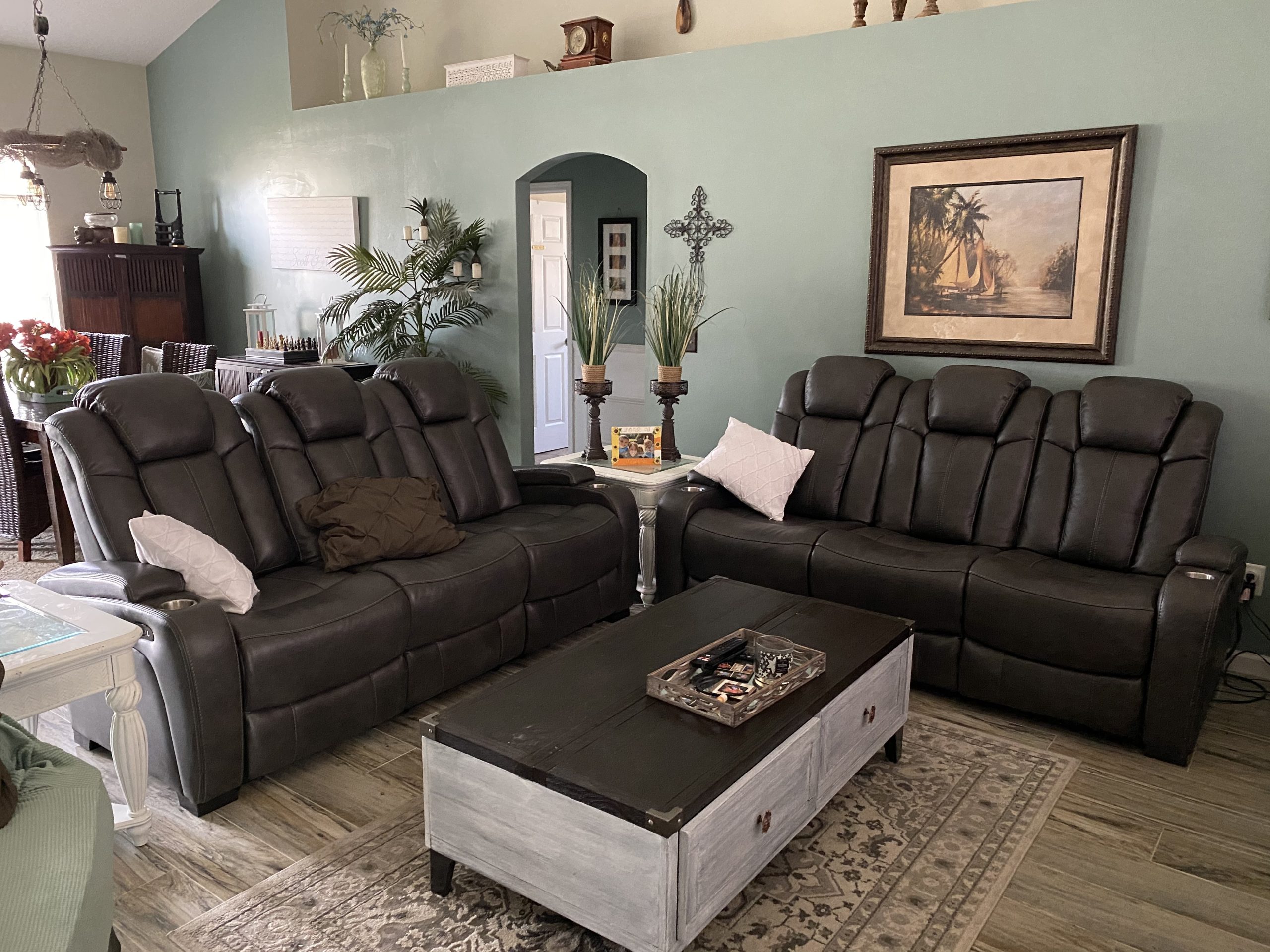 Signature Design by Ashley Wolfridge Power Reclining Sofa, Brindle | Dual electric recline for custom comfort, Drop-down table with wireless charging, Easy-clean brindle faux leather customer photo 1