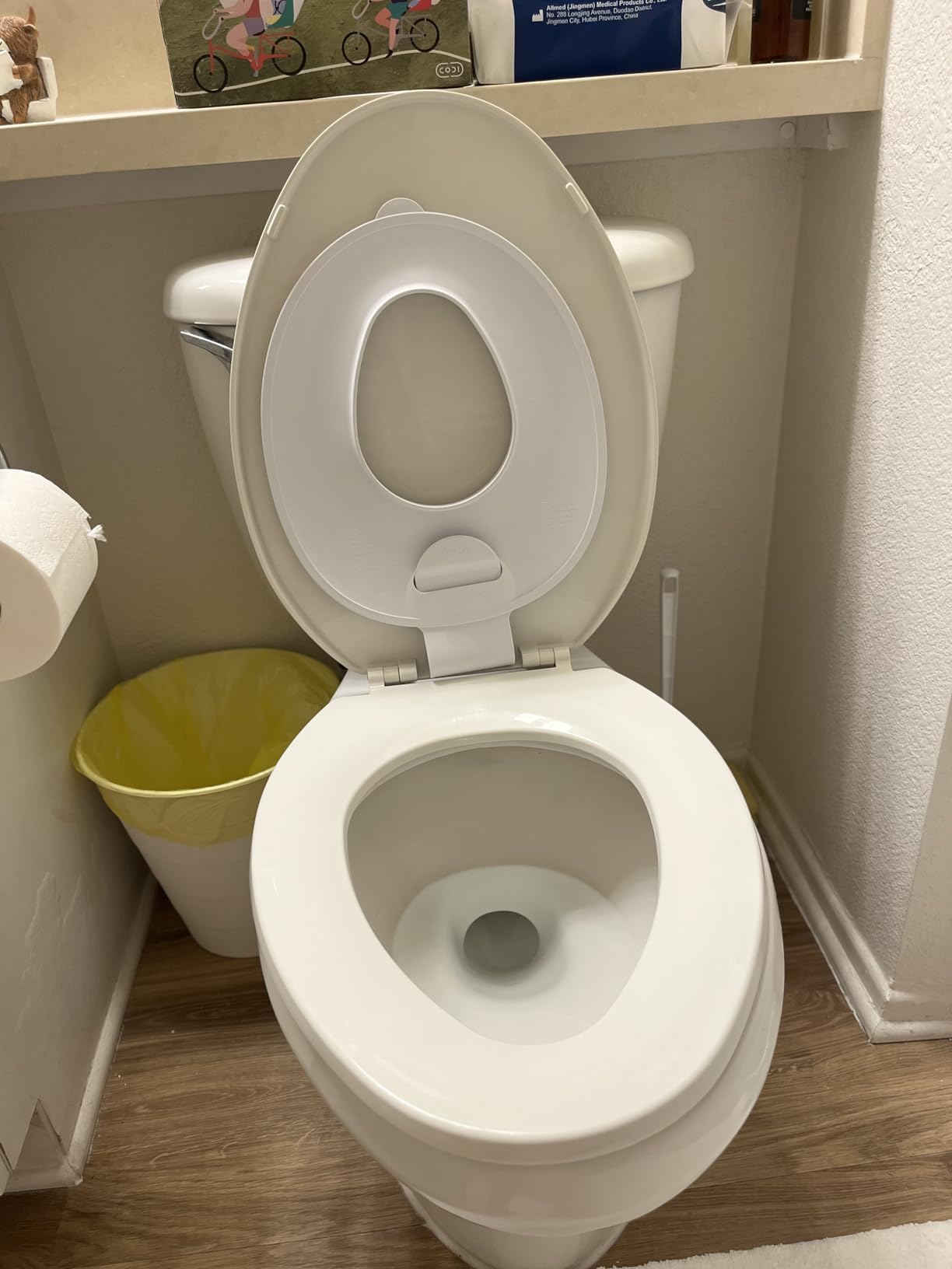 Frida Baby Drop Down Potty Seat, Potty Training Seat for Toddlers, Attaches Securely to Adult Toilet, Flips Up or Stays Down for Kid Ready Access, Easy to Clean, Secure, Stable & Easy to Install customer photo 2