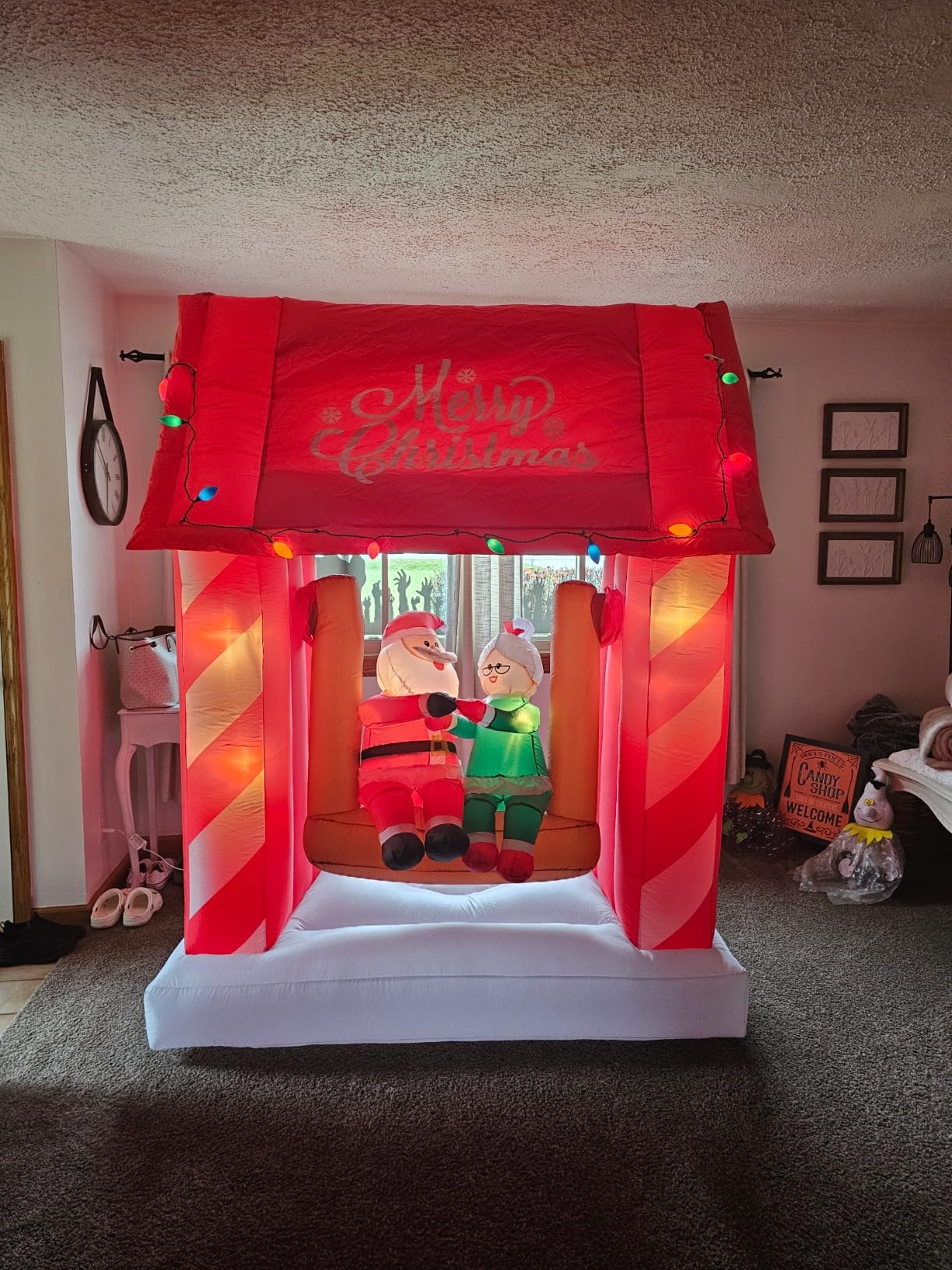 Gemmy Animated Christmas Inflatable Mr. and Mrs. Claus on Swing, 7 ft Tall, Multi customer photo 1