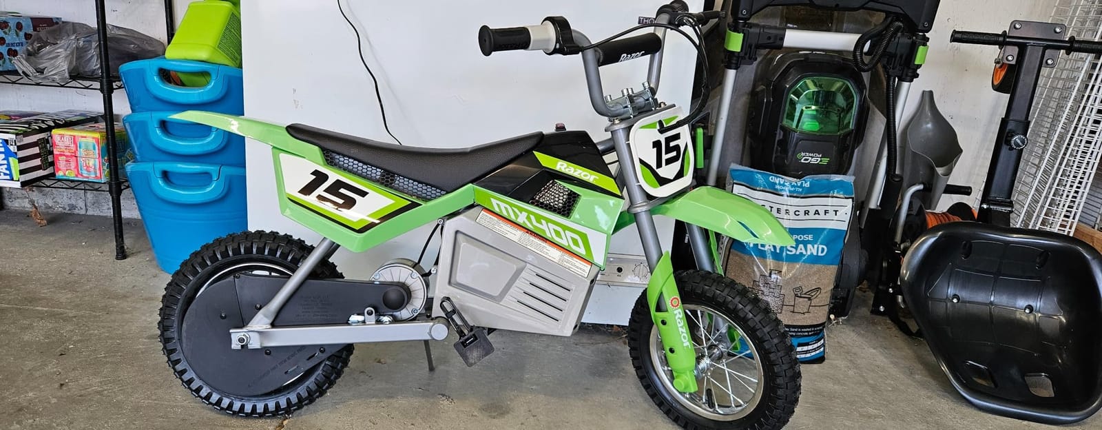 Razor MX400 Dirt Rocket Electric Bike for Kids Ages 8+, 140 Pounds Max Weight, Green – 24-Volt Battery, up to 14 Mph, 30-Minute High Speed Ride Time, Twist-Grip Throttle, 12-Inch Pneumatic Tires customer photo 1