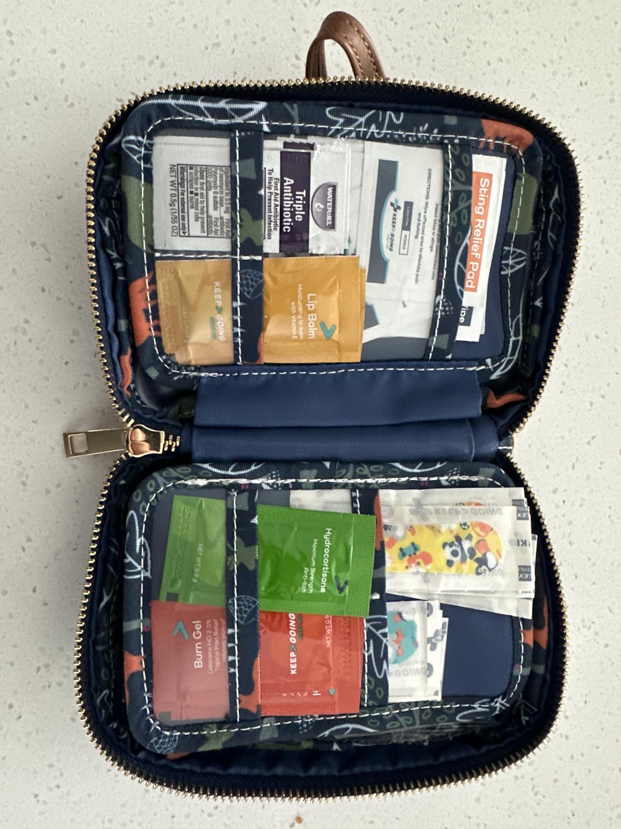 KeepGoing Travel First Aid Kit for Kids, 130 Pc. TSA-Approved Travel Size customer photo 2