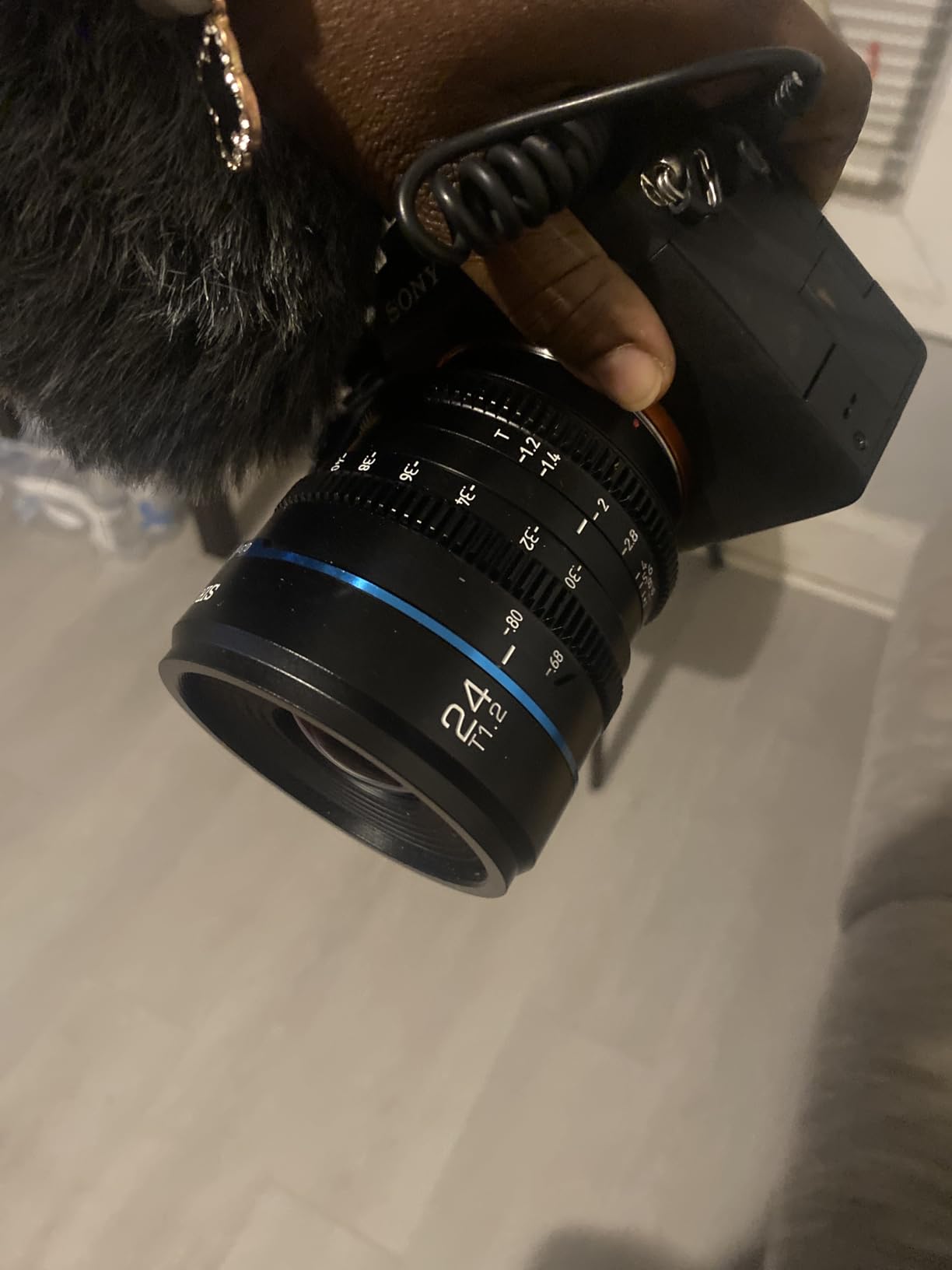 SIRUI Night Walker 24mm S35 Manual Focus Cine Lens, T1.2 Large Aperture Lens for E Mount Cameras, FX30, ZVE-10, A6500, A6600 (MS24E-B, Black) customer photo 1