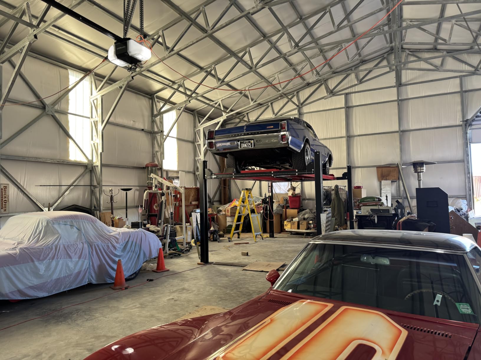 KT-4H950 110V 3.0HP Four Post Lift Car Truck Parking Hoist Aluminum Plate with Casters and 9500Lbs Lifting Capacity,Max Lifting Height 84.5 Inch Extra Wide 113 Inch customer photo 1