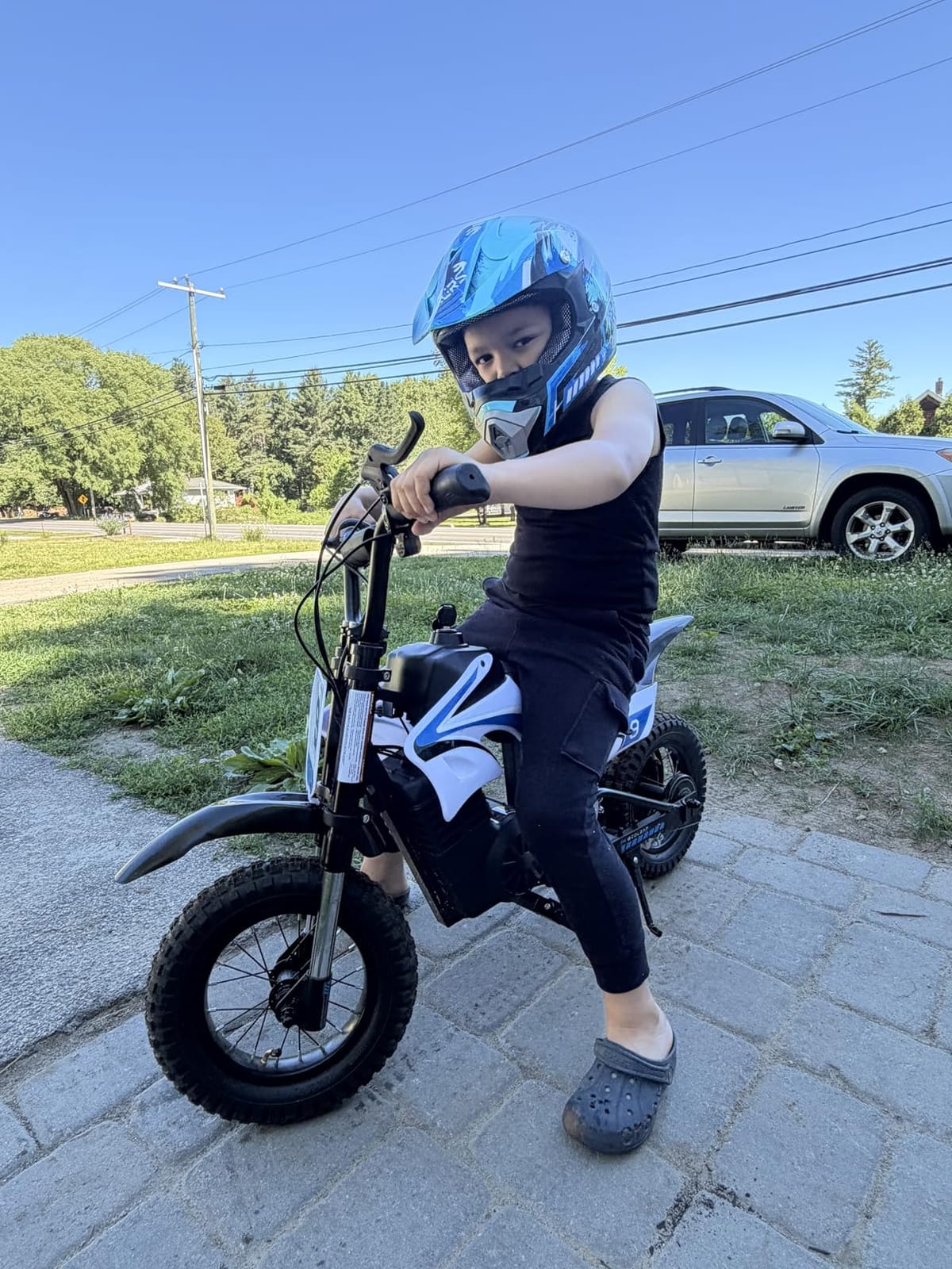 K1 Kids Electric Dirt Bike, 36V, 700W, 16 MPH, 14-Mile, Ages 3-10 (Sky Blue) customer photo 2
