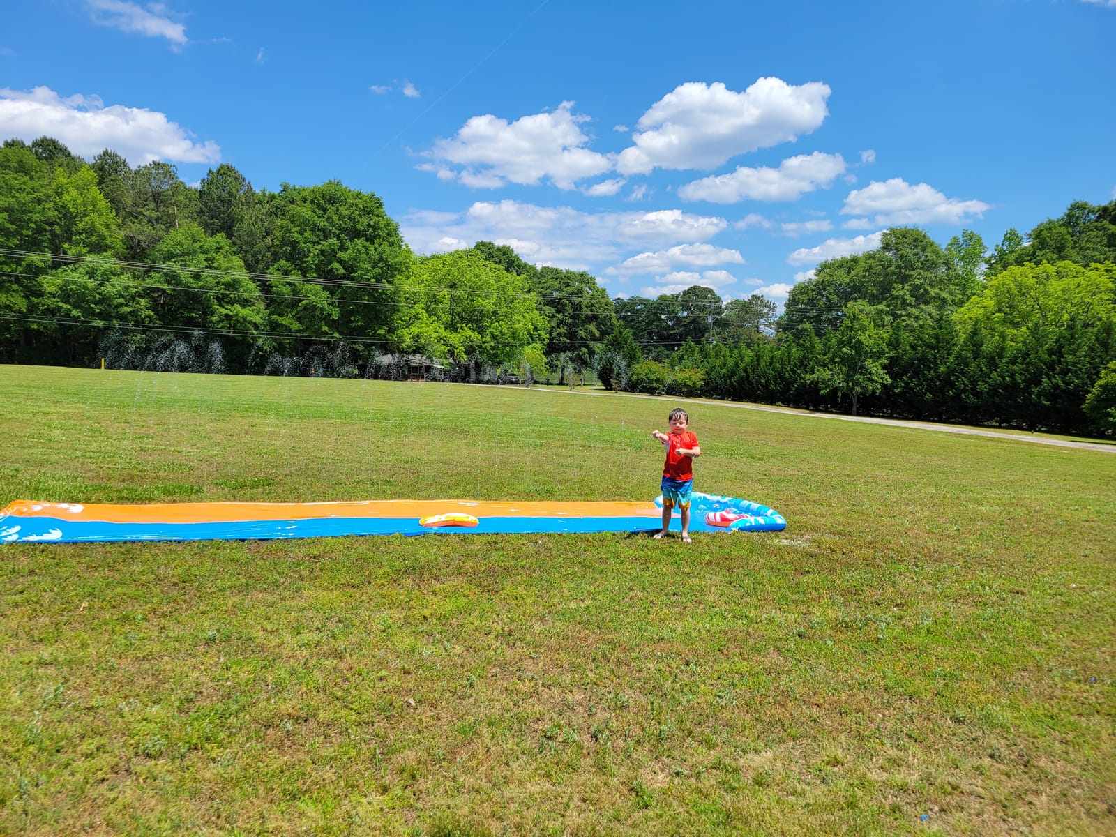 JOYIN 22.5ft Water Slides and 2 Bodyboards, Lawn Water Slide Summer Slip Waterslides Water Toy with Build in Sprinkler for Backyard Outdoor Water Fun for Kids customer photo 1