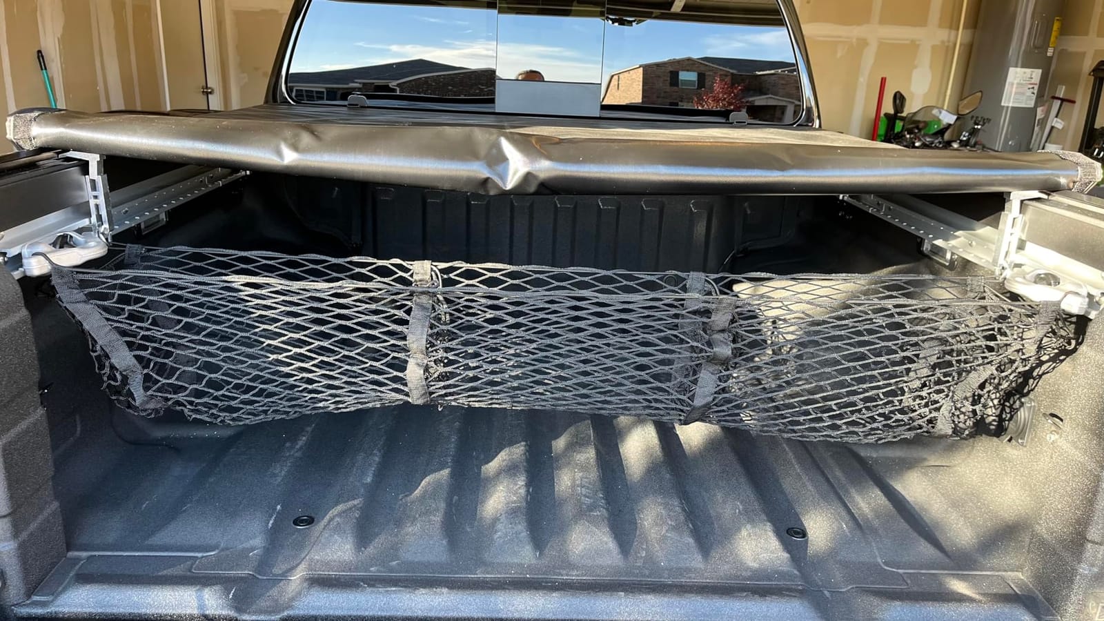 Amiss Heavy Duty Mesh Cargo Net, 3 Pocket Trunk Bed Storage Organizer Compatible for SUV, Car, Pickup Truck Bed, Etc.with 4 Metal Hooks (11.8×11.8×47.3 Inch), Black customer photo 2